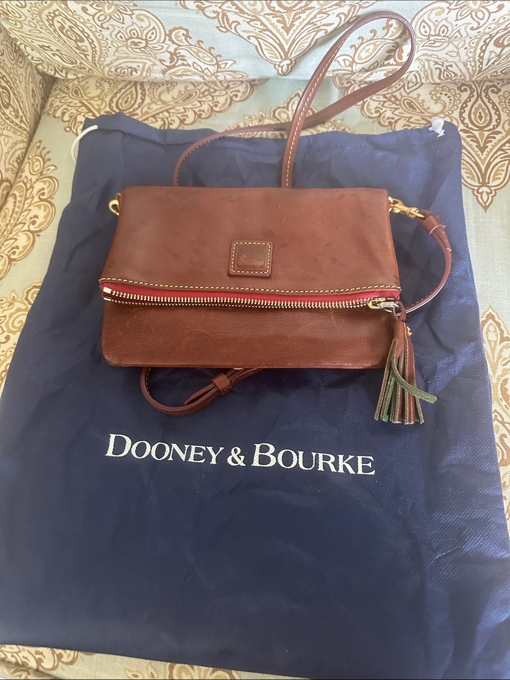 Dooney & Bourke Brown Leather Crossbody with Tassel Accent